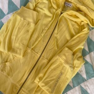 Yellow Peloton hoodie M white design